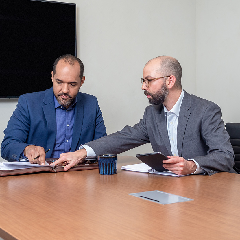 Two financial professionals discuss TruStage™  MEMBERS® Future Income Annuity (FIA) performance.